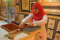 Egyptian Woman Demonstrating the Art of Paper Making at the Papyrus Institute, Luxor, Egypt